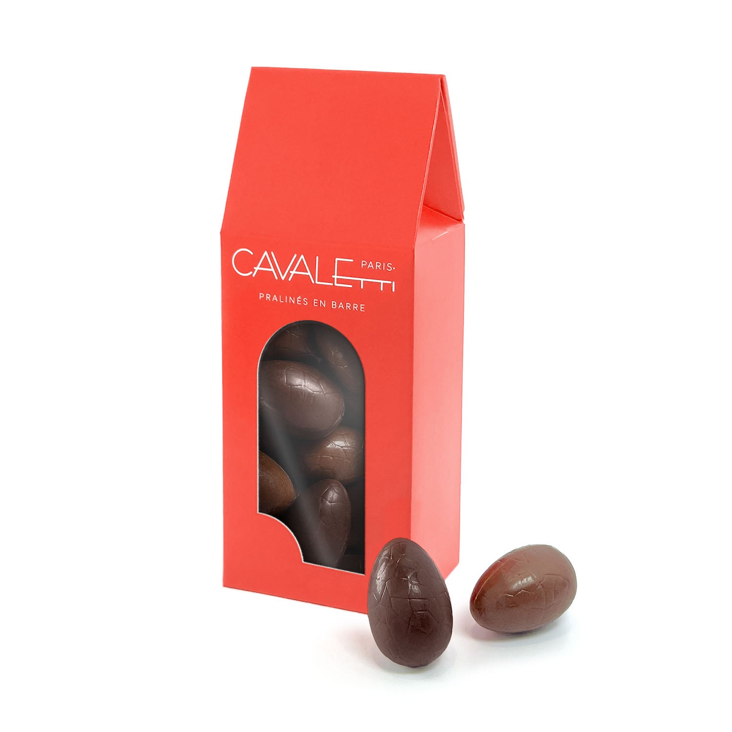 Ballotin d'oeufs en chocolat de paques fourrés au praliné artisanal. Chocolat au lait et chocolat noir par Cavaletti Paris. 