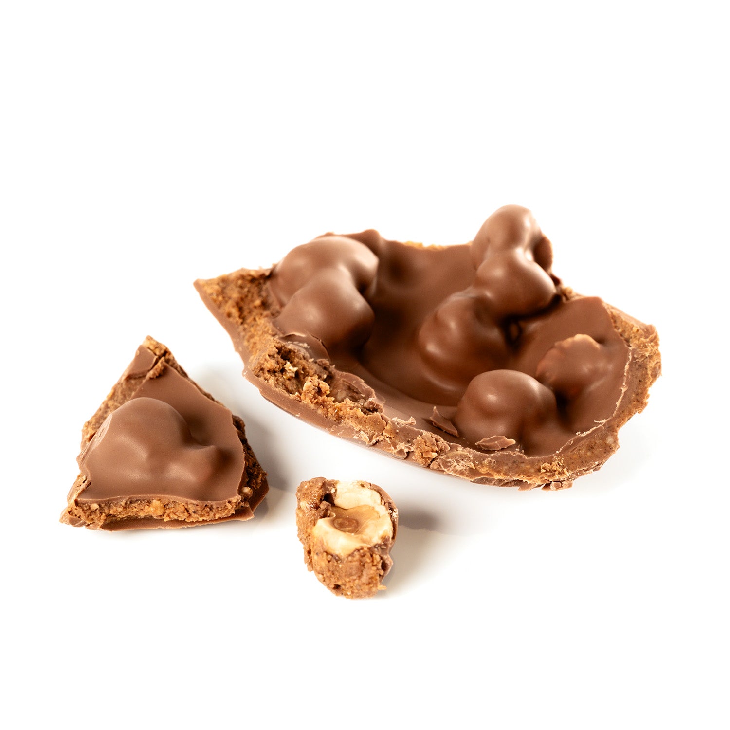 Chocolat au lait artisanal fourré au praliné haut de gamme et aux noisettes caramélisée. Une création originale et artisanale par Cavaletti Paris, maison de chocolat à Neuilly sur Seine.