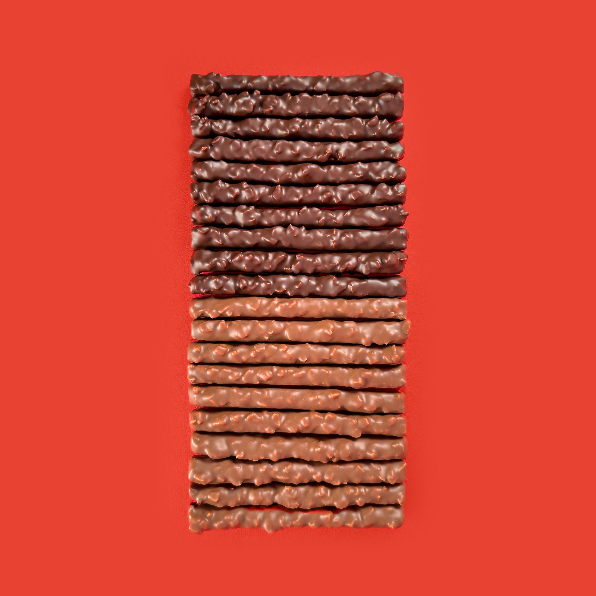 Chocolat praliné en barre chocolat facon rocher aux amandes. Confection haut de gamme artisanale à Neuilly sur seine dans notre maison de chocolat Cavaletti paris.