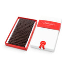Coffret chocolats praliné façon rocher aux amandes, au chocolat noir par Cavaletti Paris, maitre chocolatier à Neuilly sur seine. 