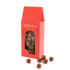 Billes de chocolats praliné fondantes et craquantes. Pour offrir. Nos billes sont fabriquées à l'ancienne dans notre atelier chocolatier de Neuilly sur Seine.